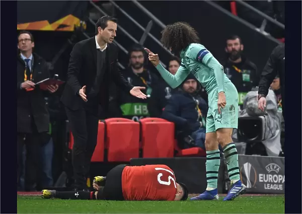 Arsenal's Guendouzi and Rennes Manager Clash in Europa League First Leg