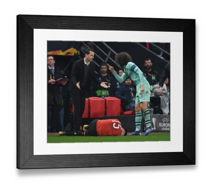 Framed Print : Arsenal's Guendouzi and Rennes Manager Clash in Europa League First Leg Framed Print : Arsenal's Guendouzi and Rennes Manager Clash in Europa League First Leg