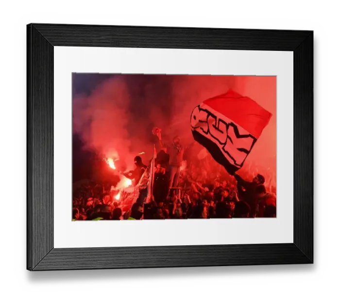 Framed Print : Arsenal Fans Face Off Against Rennes Supporters in Europa League Clash
