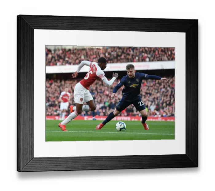 Framed Print : Arsenal vs Manchester United: Premier League Showdown at Emirates Stadium Framed Print : Arsenal vs Manchester United: Premier League Showdown at Emirates Stadium