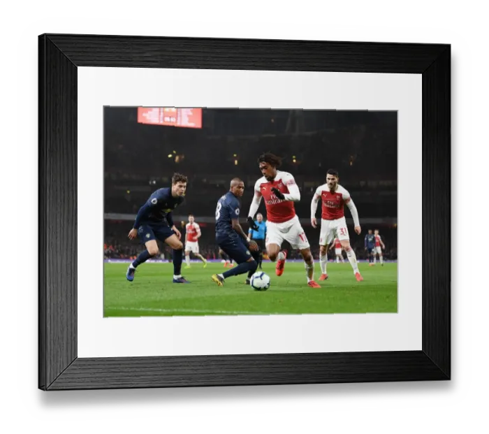 Framed Print : Arsenal vs Manchester United: Premier League Showdown at Emirates Stadium