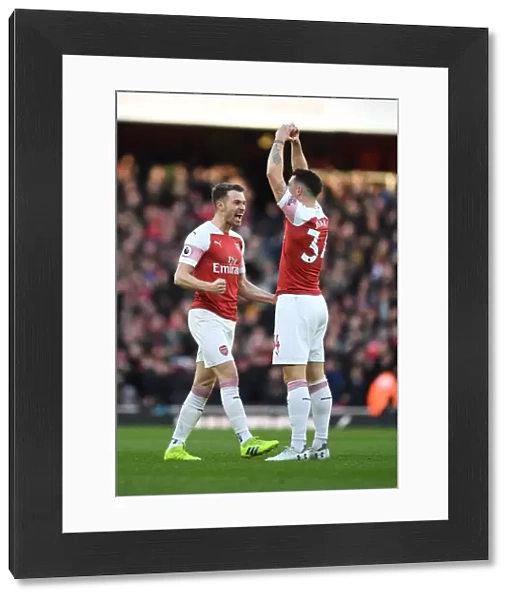 Arsenal's Xhaka and Ramsey: Unstoppable Duo Celebrates Goal Against Manchester United