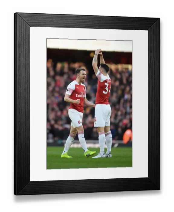Framed Print : Arsenal's Xhaka and Ramsey: Unstoppable Duo Celebrates Goal Against Manchester United Framed Print : Arsenal's Xhaka and Ramsey: Unstoppable Duo Celebrates Goal Against Manchester United