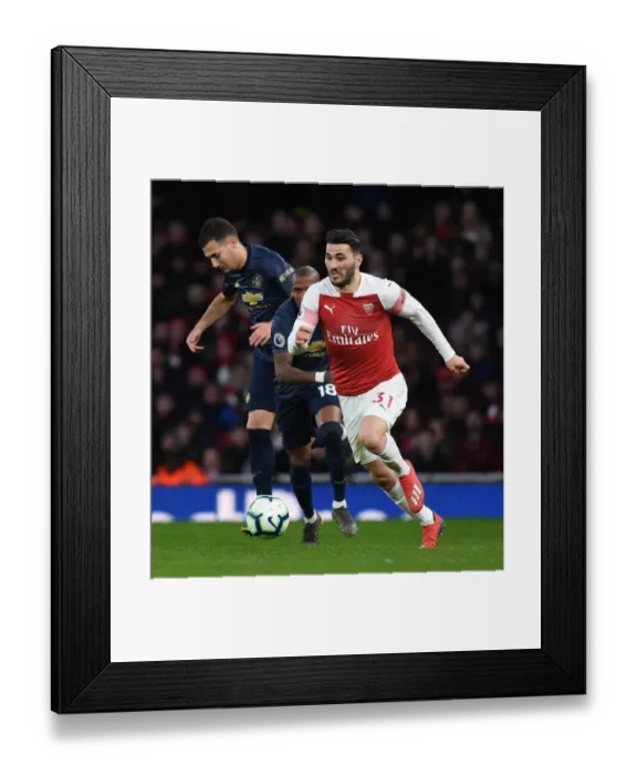 Framed Print : Arsenal vs Manchester United: Premier League Showdown at Emirates Stadium