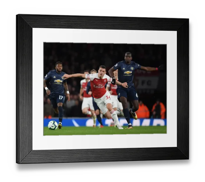 Framed Print : Xhaka vs Pogba: A Midfield Battle - Arsenal vs Manchester United, Premier League 2018-19