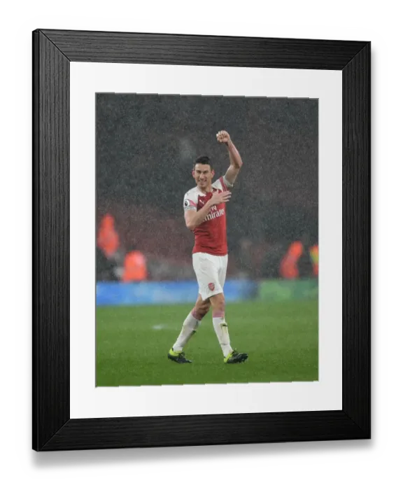 Framed Print : Laurent Koscielny: Arsenal's Defiant Figure Amidst Manchester United Battle Framed Print : Laurent Koscielny: Arsenal's Defiant Figure Amidst Manchester United Battle