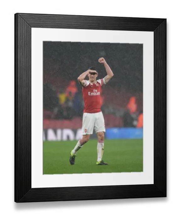 Framed Print : Laurent Koscielny: Arsenal's Defiant Figure in the Face of Manchester United