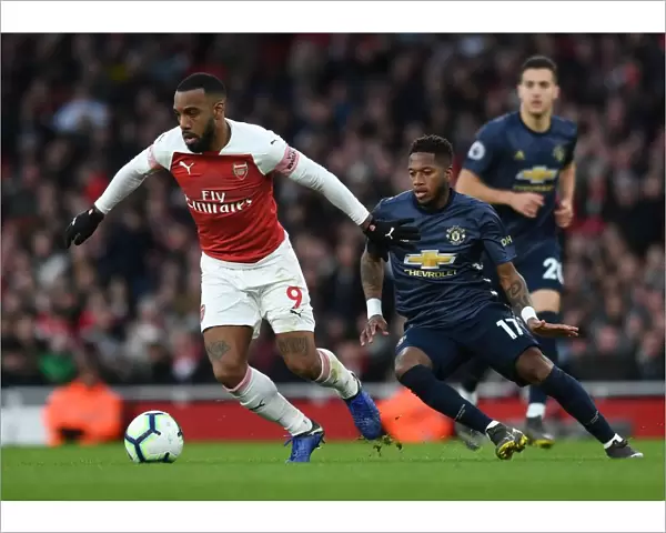 Arsenal's Lacazette Clashes with Manchester United's Fred in Premier League Showdown