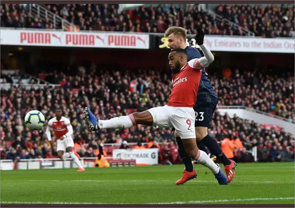 Clash at the Emirates: Lacazette vs Shaw in Arsenal's Battle Against Manchester United
