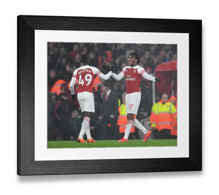Framed Print : Arsenal's Nketiah and Iwobi Celebrate after Arsenal FC vs Manchester United, Premier League 2018-19