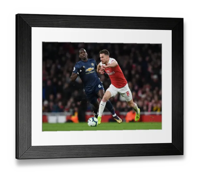 Framed Print : Clash of Midfield Titans: Ramsey vs. Pogba - Arsenal vs. Manchester United, Premier League Framed Print : Clash of Midfield Titans: Ramsey vs. Pogba - Arsenal vs. Manchester United, Premier League