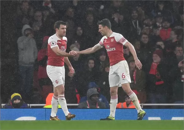 Arsenal's Sokratis and Koscielny: A Defensive Duo in Action against Manchester United (2018-19)