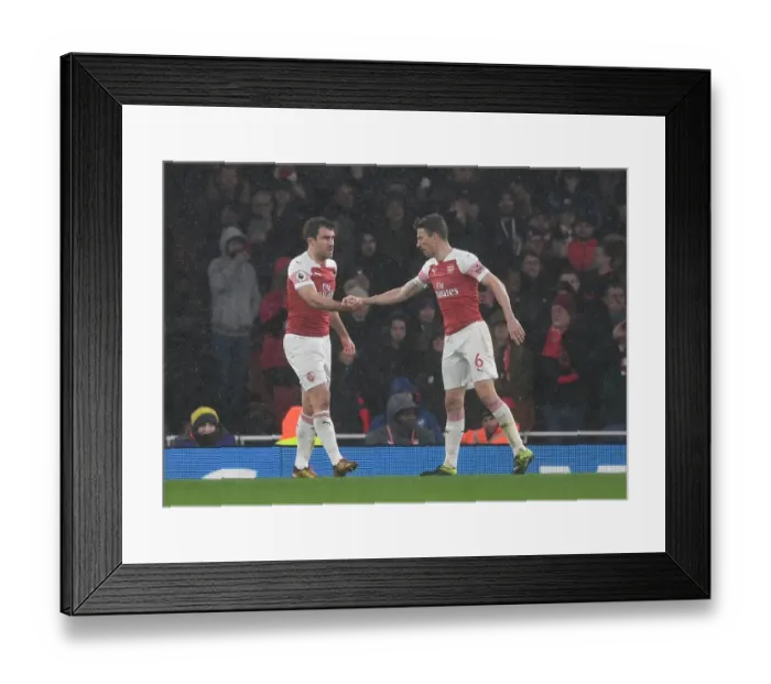 Framed Print : Arsenal's Sokratis and Koscielny: A Defensive Duo in Action against Manchester United (2018-19) Framed Print : Arsenal's Sokratis and Koscielny: A Defensive Duo in Action against Manchester United (2018-19)
