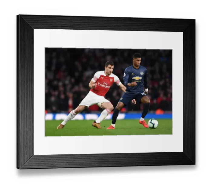 Framed Print : Arsenal vs Manchester United: Sokratis vs Rashford - Premier League Clash Framed Print : Arsenal vs Manchester United: Sokratis vs Rashford - Premier League Clash