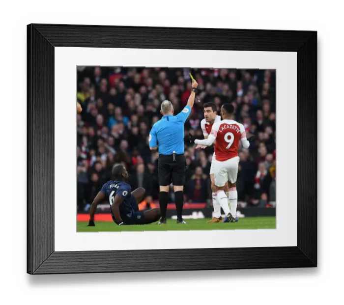 Framed Print : Arsenal's Sokratis Fouls Manchester United's Pogba: Jon Moss Issues Yellow Card (Arsenal v Manchester United 2018-19)