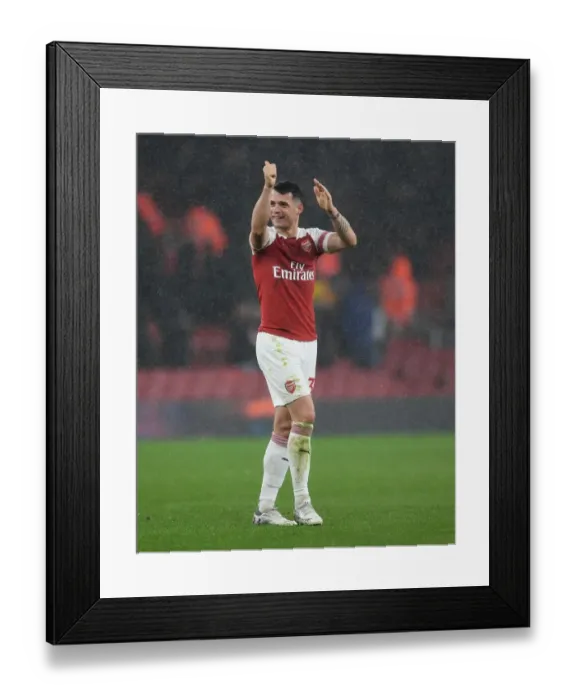 Framed Print : Granit Xhaka: Arsenal's Determined Midfielder Amidst Arsenal FC vs Manchester United Rivalry (2018-19) Framed Print : Granit Xhaka: Arsenal's Determined Midfielder Amidst Arsenal FC vs Manchester United Rivalry (2018-19)