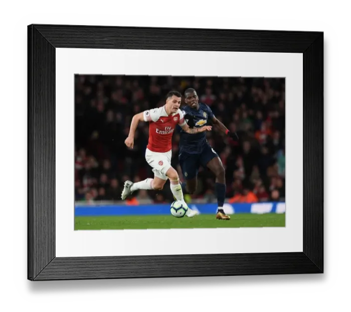 Framed Print : Clash of Midfield Titans: Xhaka vs Pogba, Arsenal vs Manchester United, Premier League
