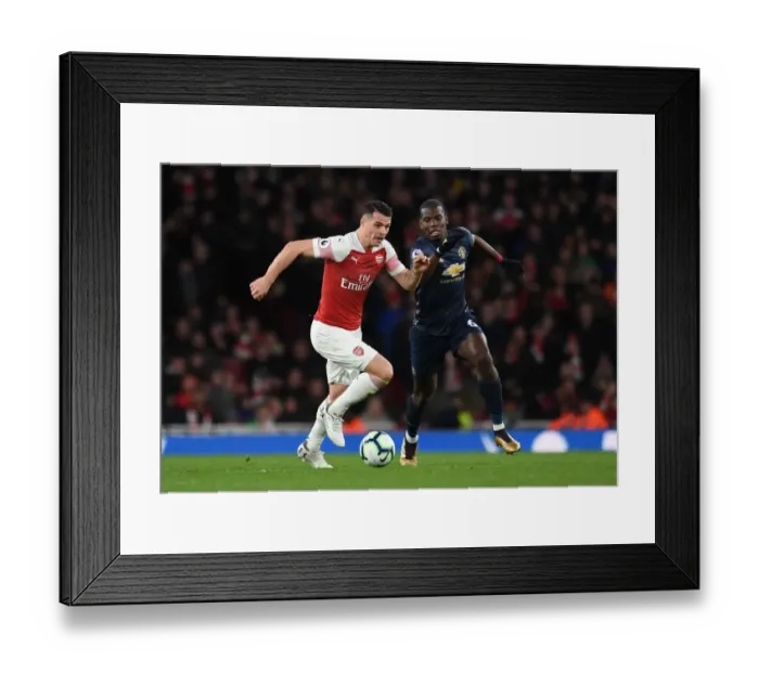 Framed Print : Clash of Midfield Titans: Xhaka vs. Pogba - Arsenal vs. Manchester United, Premier League Framed Print : Clash of Midfield Titans: Xhaka vs. Pogba - Arsenal vs. Manchester United, Premier League