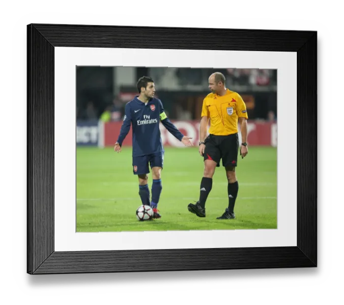 Framed Print : Cesc Fabregas (Arsenal) talks with referee during the match Framed Print : Cesc Fabregas (Arsenal) talks with referee during the match