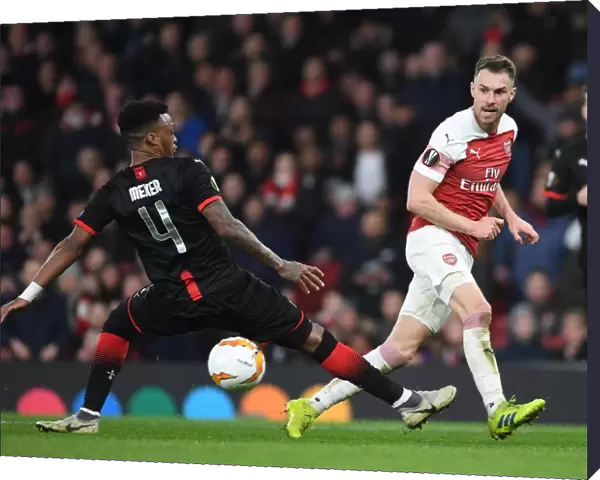 Arsenal's Aaron Ramsey Clashes with Mexer in Europa League Battle