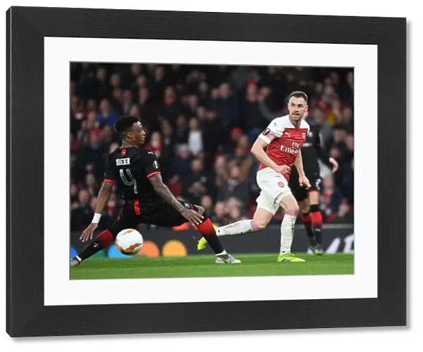 Arsenal vs Stade Rennais: Aaron Ramsey Clashes with Mexer in Europa League Showdown