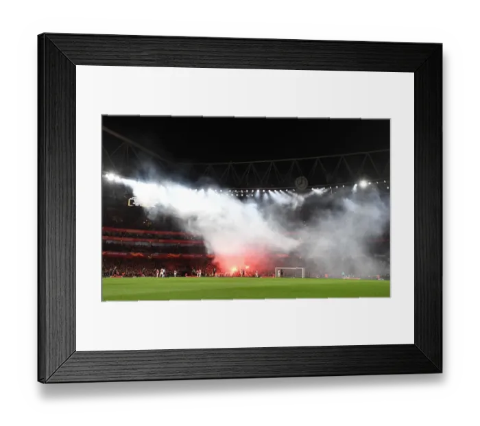 Framed Print : Arsenal vs. Stade Rennais: Europa League Clash Disrupted by Flares in Intense Atmosphere