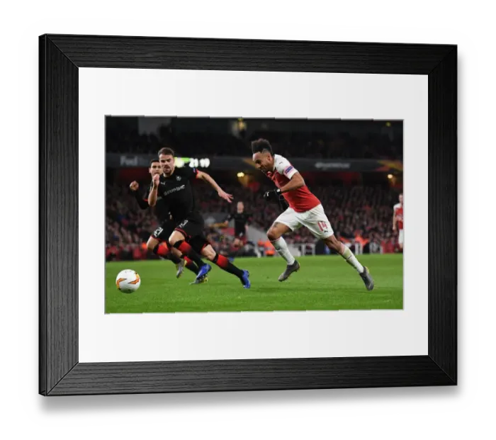Framed Print : Aubameyang's Sneaky Move: Arsenal's Europa League Triumph over Stade Rennais Framed Print : Aubameyang's Sneaky Move: Arsenal's Europa League Triumph over Stade Rennais