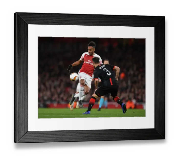 Framed Print : Aubameyang Outmaneuvers Da Silva: Arsenal vs Stade Rennais, UEFA Europa League Showdown Framed Print : Aubameyang Outmaneuvers Da Silva: Arsenal vs Stade Rennais, UEFA Europa League Showdown