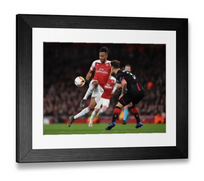 Framed Print : Aubameyang's Sneaky Move: Arsenal's Europa League Victory over Rennes Framed Print : Aubameyang's Sneaky Move: Arsenal's Europa League Victory over Rennes