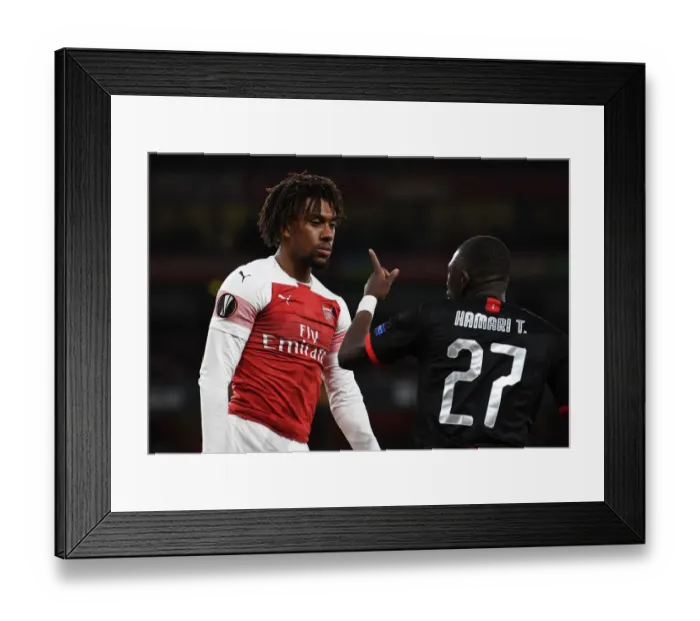 Framed Print : Arsenal's Alex Iwobi vs Hamari Traore: Europa League Clash Framed Print : Arsenal's Alex Iwobi vs Hamari Traore: Europa League Clash