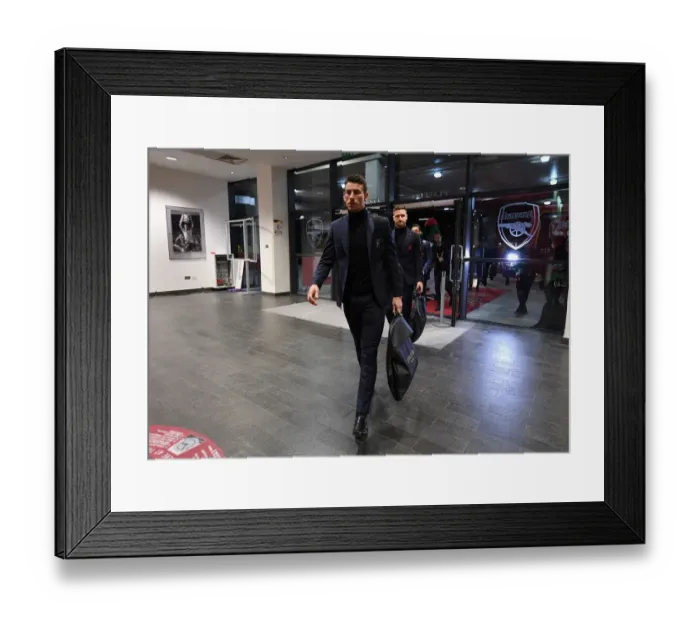Framed Print : Laurent Koscielny: Arsenal's Steely Glance Before Europa League Showdown vs Stade Rennais