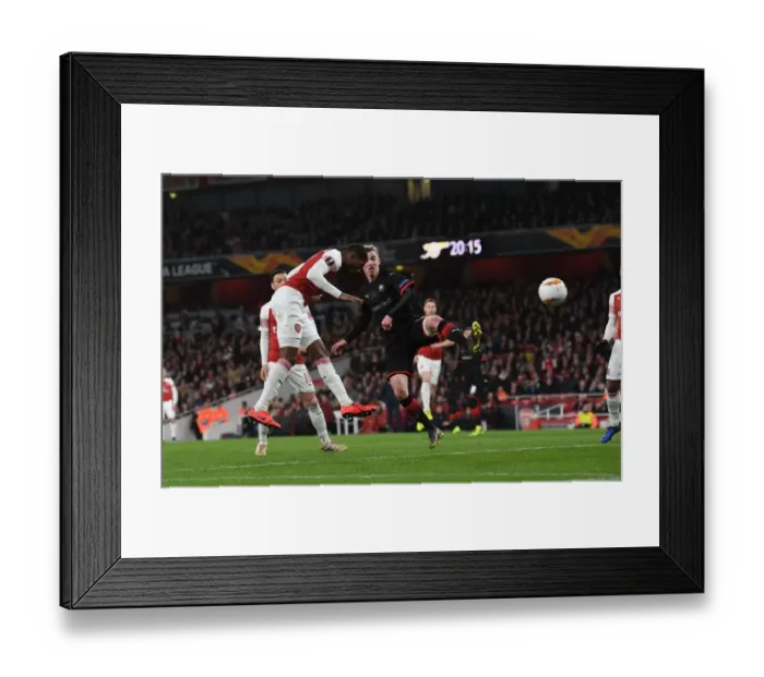 Framed Print : Ainsley Maitland-Niles Scores Arsenal's Second Goal in Europa League Match Against Stade Rennais