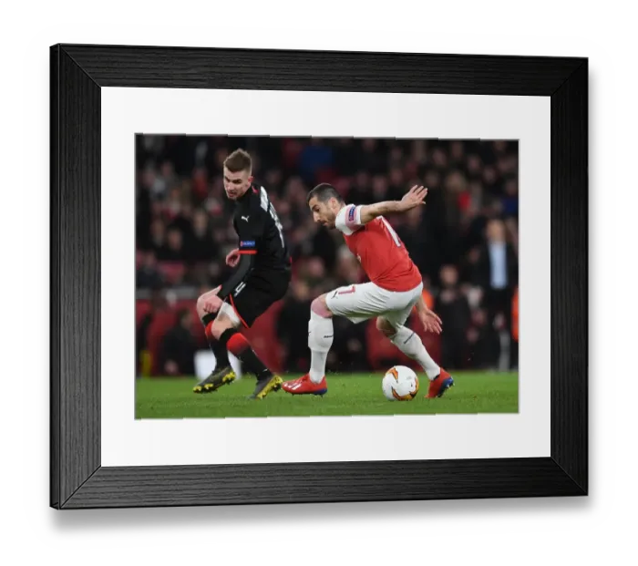 Framed Print : Mkhitaryan Tangles with Bourigeaud: Intense Moment from Arsenal's Europa League Clash with Stade Rennais