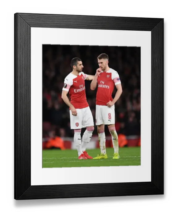 Framed Print : Arsenal's Mkhitaryan and Ramsey in Action against Stade Rennais in Europa League Clash Framed Print : Arsenal's Mkhitaryan and Ramsey in Action against Stade Rennais in Europa League Clash