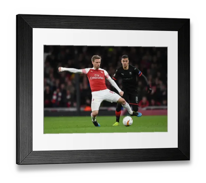 Framed Print : Monreal vs Ben Arfa: A Fiery Europa League Showdown - Arsenal vs Stade Rennais Framed Print : Monreal vs Ben Arfa: A Fiery Europa League Showdown - Arsenal vs Stade Rennais