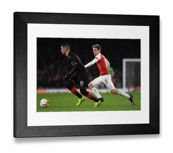 Framed Print : Nacho Monreal vs Hatem Ben Arfa: Intense Clash in Arsenal v Stade Rennais UEFA Europa League Match Framed Print : Nacho Monreal vs Hatem Ben Arfa: Intense Clash in Arsenal v Stade Rennais UEFA Europa League Match