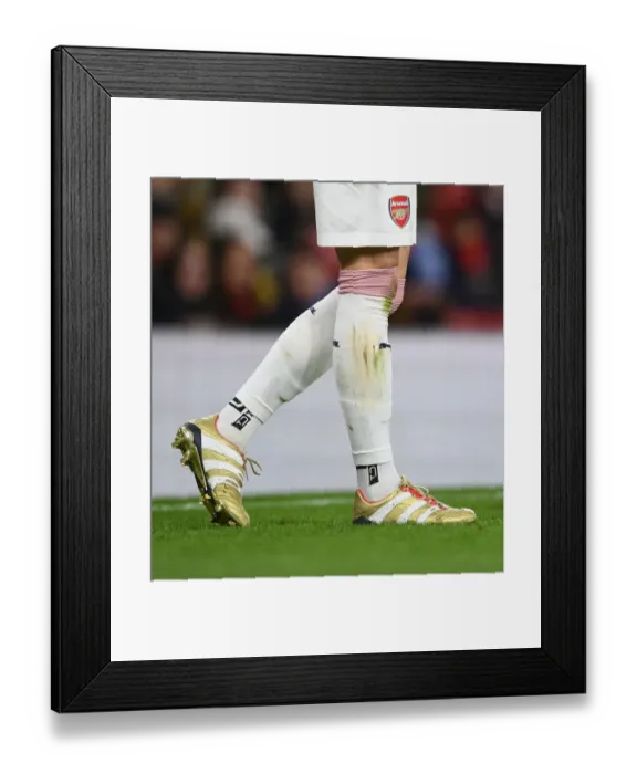 Framed Print : Mesut Ozil's New Boots: Arsenal vs Stade Rennais, UEFA Europa League Round of 16 (2019)