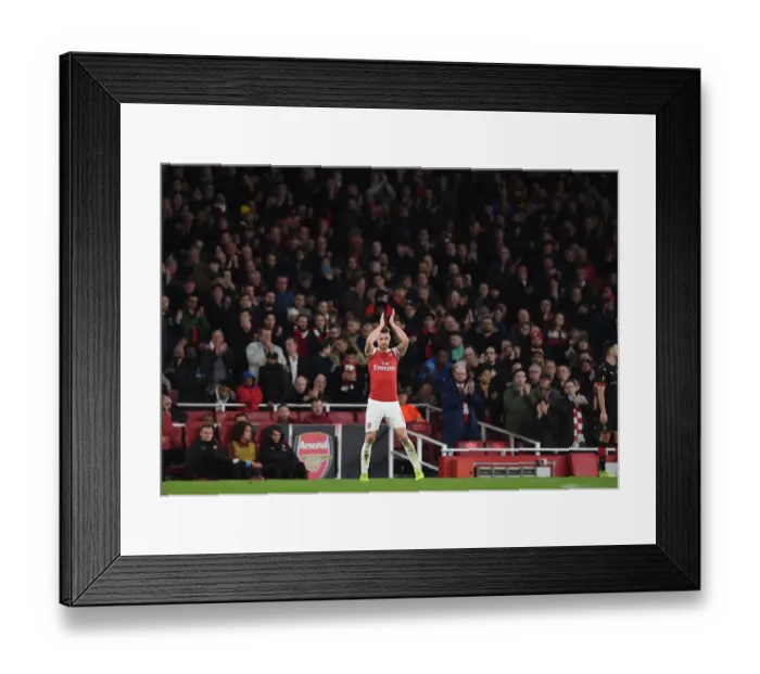 Framed Print : Aaron Ramsey Bids Farewell: Emotional Moment as He's Substituted in Arsenal's Europa League Clash against Stade Rennais Framed Print : Aaron Ramsey Bids Farewell: Emotional Moment as He's Substituted in Arsenal's Europa League Clash against Stade Rennais