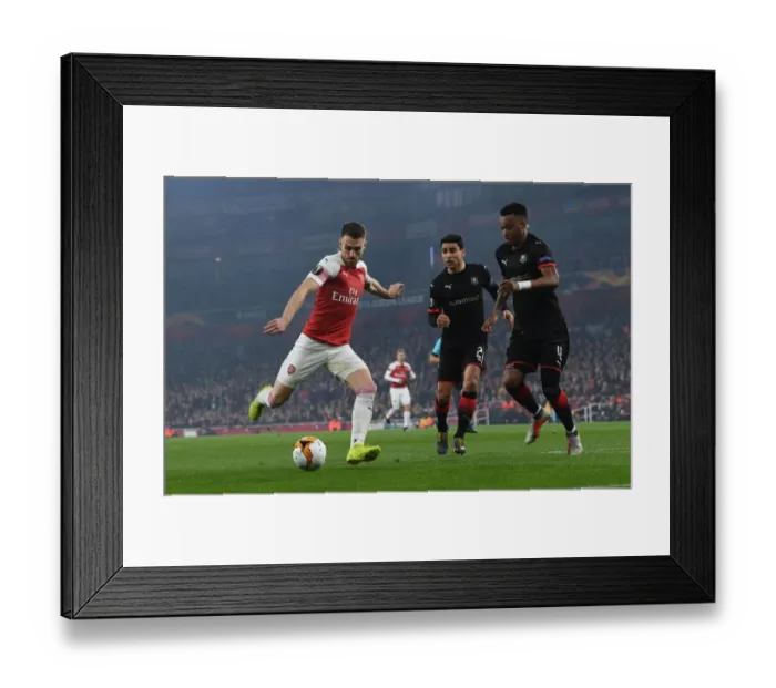 Framed Print : Aaron Ramsey vs Mexer: Clash at the Emirates - Arsenal vs Stade Rennais, UEFA Europa League 2019 Framed Print : Aaron Ramsey vs Mexer: Clash at the Emirates - Arsenal vs Stade Rennais, UEFA Europa League 2019