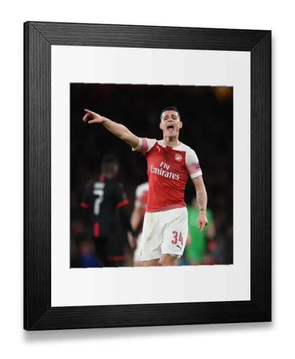 Framed Print : Granit Xhaka's Europa League Showdown: Arsenal vs Stade Rennais (2018-19)