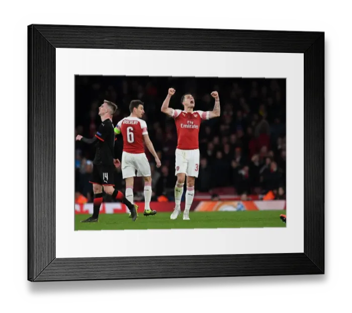 Framed Print : Granit Xhaka's Emotional Celebration: Arsenal Clinch Europa League Victory over Stade Rennais Framed Print : Granit Xhaka's Emotional Celebration: Arsenal Clinch Europa League Victory over Stade Rennais