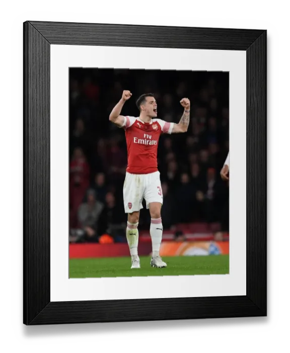 Framed Print : Granit Xhaka's Emotional Europa League Triumph: Arsenal Secures Victory over Stade Rennais