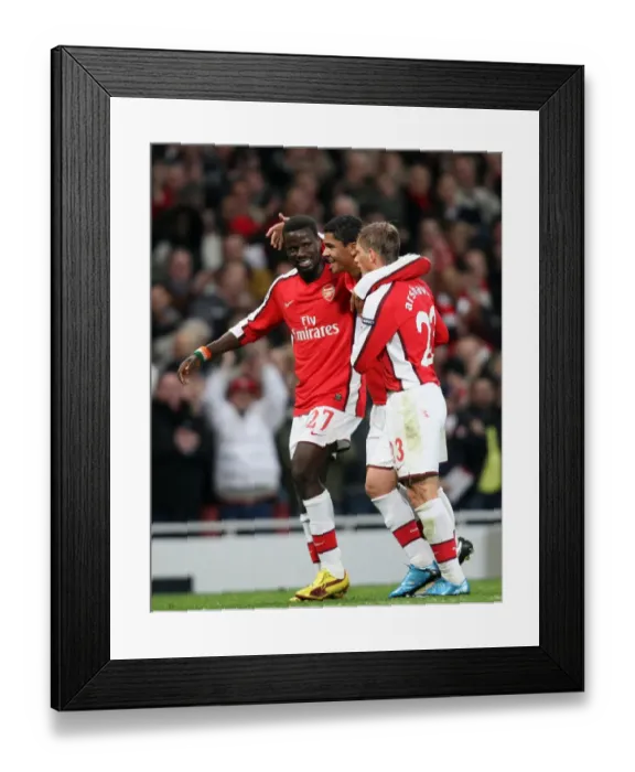 Framed Print : Denilson, Eboue, and Arshavin: Arsenal's Unforgettable Duo Goal Celebration in Champions League Victory (2:0 vs Standard Liege, 2009)