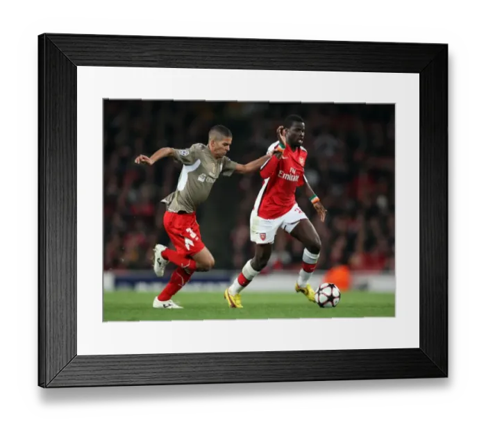 Framed Print : Emmanuel Eboue (Arsenal) Medhi Carcela-Gonzalez (Liege) Framed Print : Emmanuel Eboue (Arsenal) Medhi Carcela-Gonzalez (Liege)
