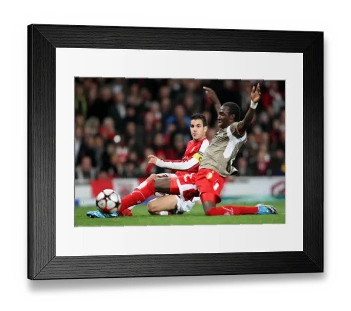 Framed Print : Arsenal's Fabregas Shines as Gunners Top Standard Liege 2-0 in Champions League