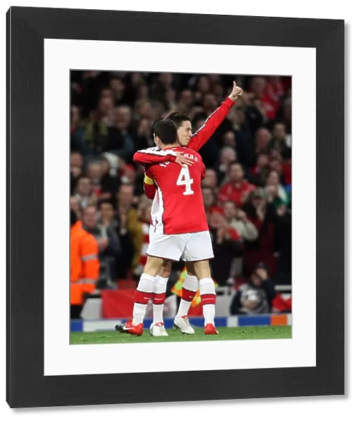 Samir Nasri celebrates scoring Arsenals 1st goal with Cesc Fabregas