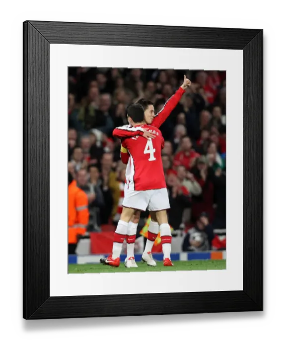 Framed Print : Samir Nasri celebrates scoring Arsenals 1st goal with Cesc Fabregas