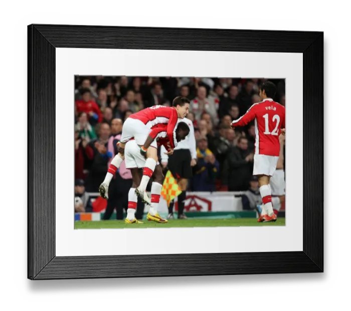 Framed Print : Unstoppable Arsenal Trio: Nasri, Eboue, Vela Celebrate First Goals in 2:0 UEFA Champions League Victory over Standard Liege (2009, Emirates Stadium) Framed Print : Unstoppable Arsenal Trio: Nasri, Eboue, Vela Celebrate First Goals in 2:0 UEFA Champions League Victory over Standard Liege (2009, Emirates Stadium)