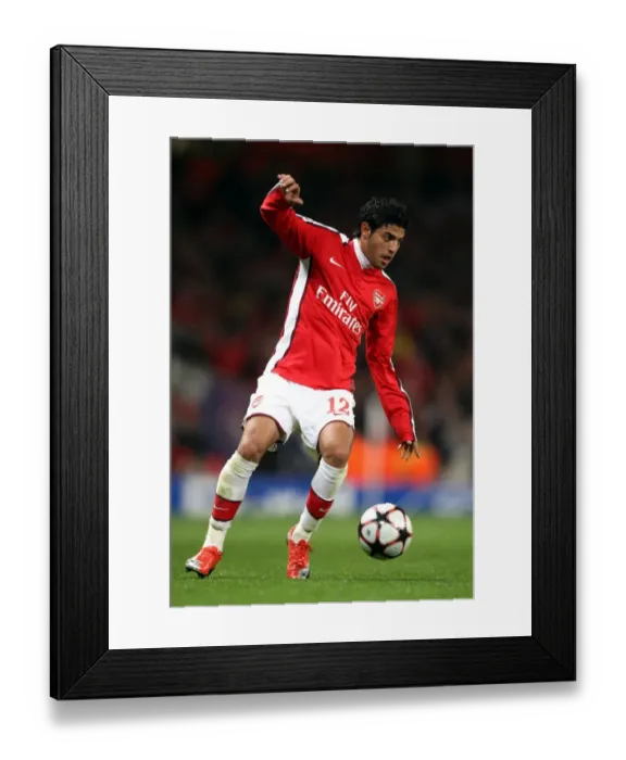 Framed Print : Carlos Vela Scores the Winning Goal: Arsenal's 2-0 Victory over Standard Liege in UEFA Champions League Group H