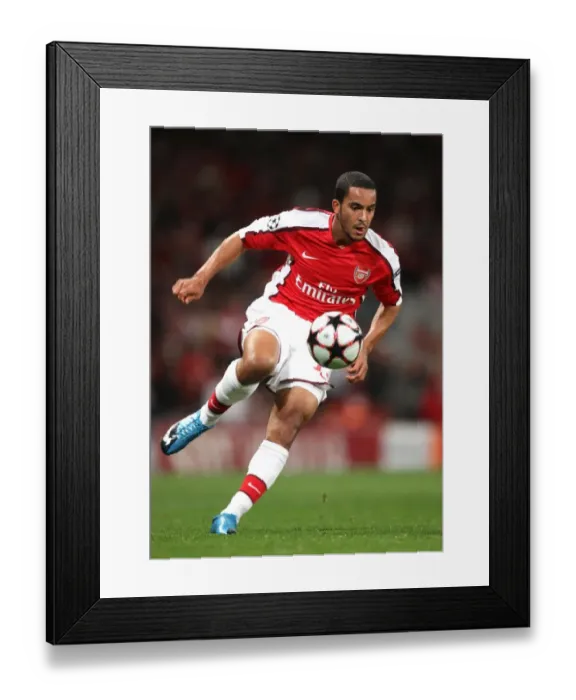 Framed Print : Theo Walcott's Brace: Arsenal Cruises Past Standard Liege 2-0 in Champions League